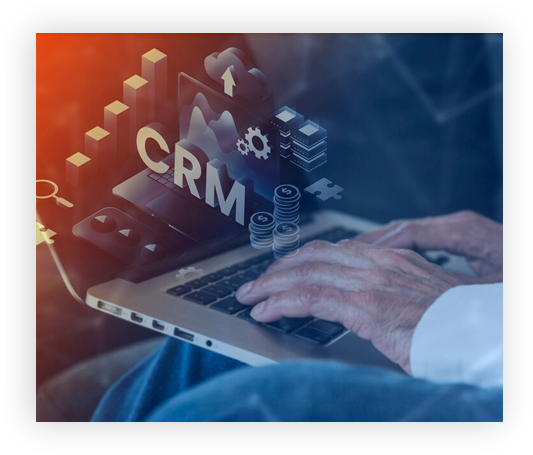 A close-up of a laptop with a holographic image of coins and graphs displayed over it.